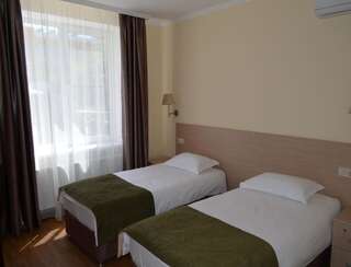 Гостиница  «Майский» Краснодар Двухместный номер эконом-класса с 2 отдельными кроватями-4
